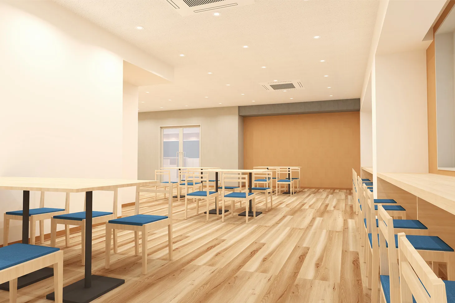 白い壁と木目調の床が広がる、ビュッフェレストランのダイニングエリア。青い座面の椅子と木製のテーブルが並び、奥にはオレンジのアクセントウォールが見える。